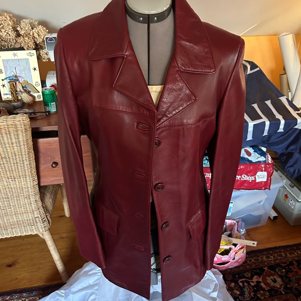 Never be worn, real leather jacket purchased in Quebec.